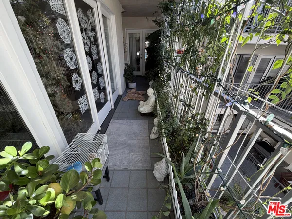 a view of swimming pool with seating area