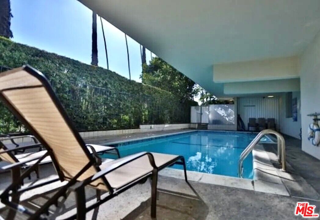 843 4th Street, Unit 207 Santa Monica, CA 90403 - Photo 31 of 49 a view of swimming pool with seating area