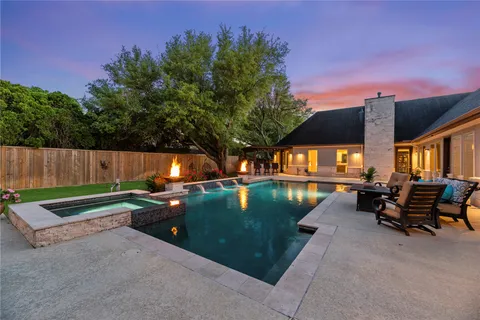 a view of a backyard with a garden