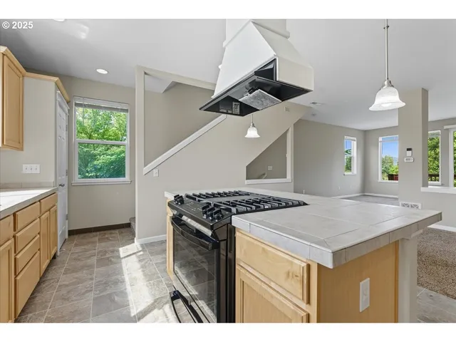 a view of balcony with wooden floor