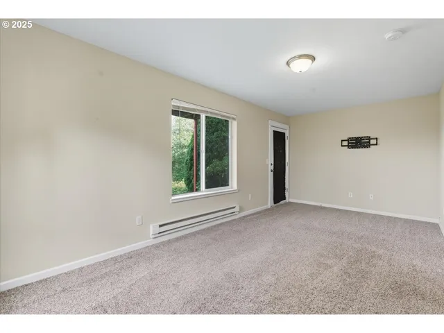 a bathroom with a granite countertop sink toilet a large mirror a shower and a bathtub
