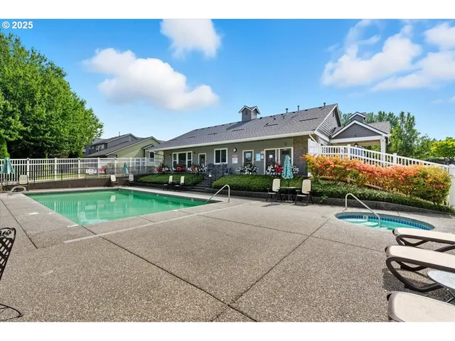 a picture of a bench in front of a wall