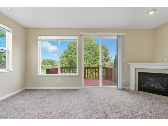 a view of empty room with front door
