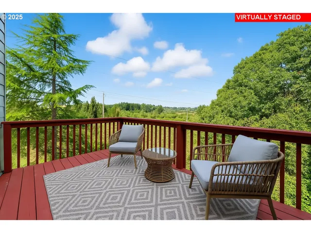 a view of balcony with wooden floor