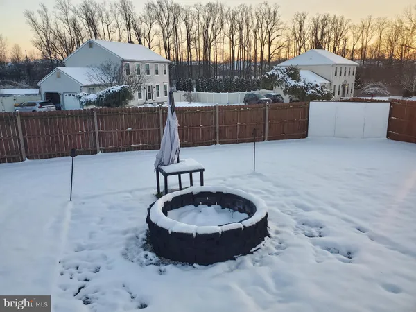 a view of a backyard with a tub