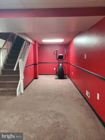 a front view of a room with gym equipment