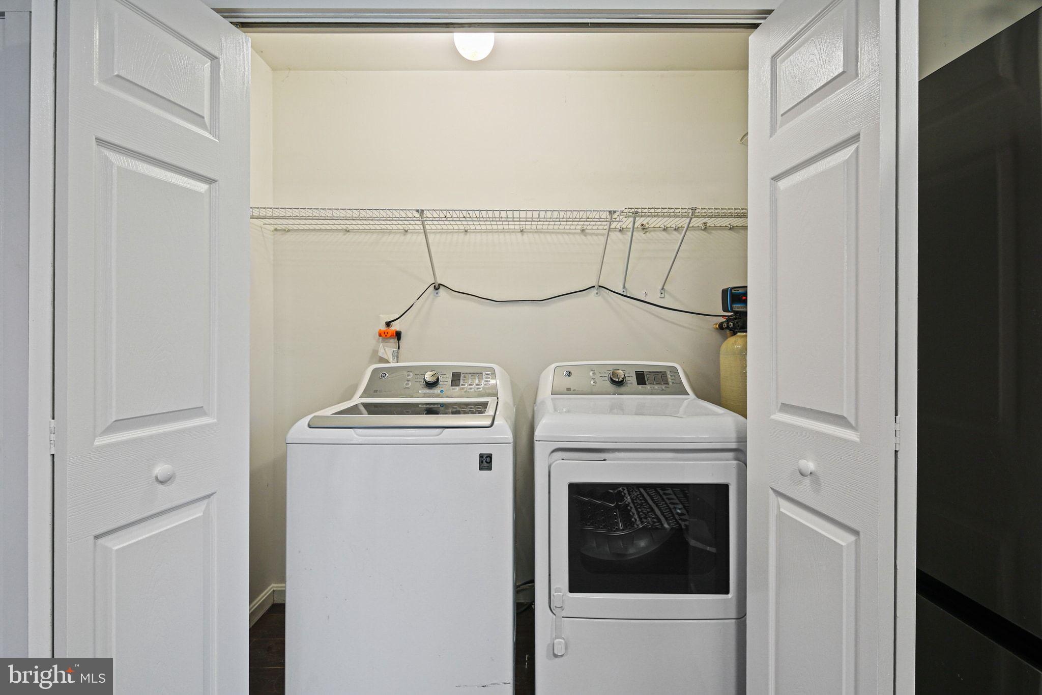 1617 Midland Road Edgewater, MD 21037 - Photo 12 of 41 a view of washer and dryer with an empty room