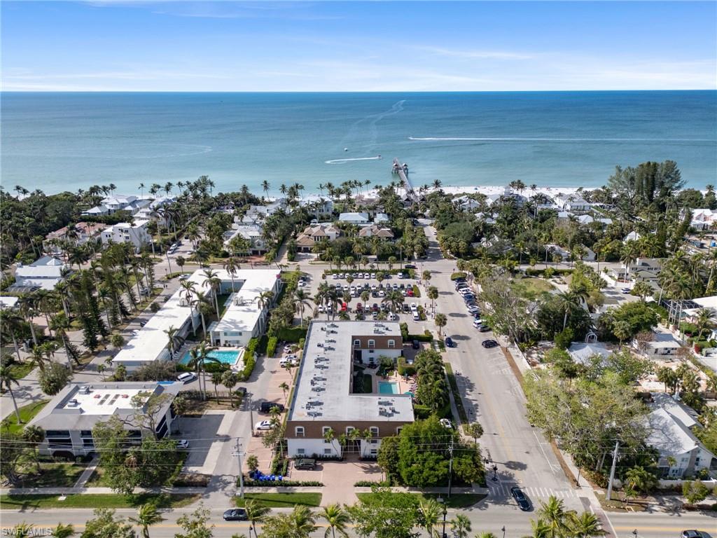 1222 Gordon Drive, Unit 2 Naples, FL 34102 - Photo 1 of 24 Aerial perspective of suburban area with a nearby body of water
