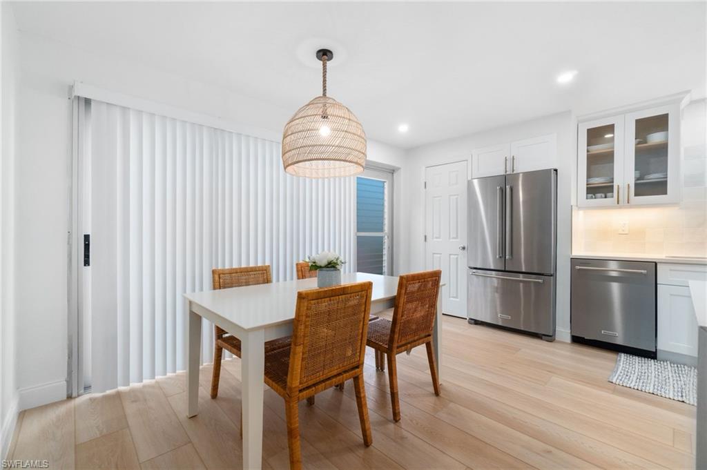 1222 Gordon Drive, Unit 2 Naples, FL 34102 - Photo 6 of 24 Dining room featuring recessed lighting and light wood finished floors