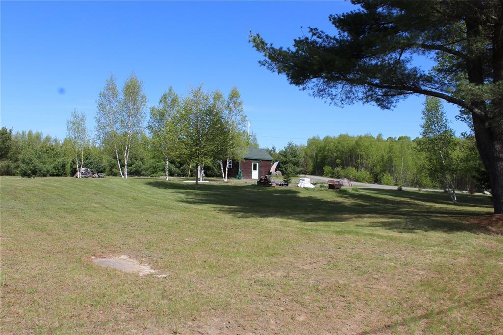 69 Sunrise Ridge Road Milo, ME 04463 - Photo 9 of 10 At the road side of Happy Camper Lane