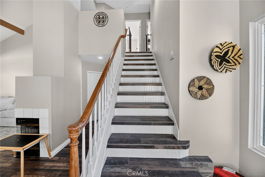27536 Swallow Court Temecula, CA 92591 - Photo 24 of 55 a view of entryway and hall with wooden floor