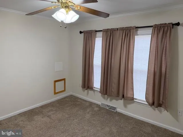 an empty room with a bathroom