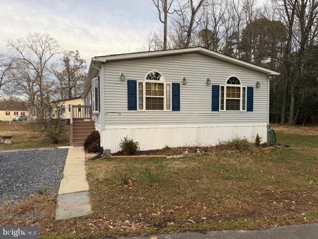 10505 Cedarville Road Brandywine, MD 20613 - Photo 2 of 23 a front view of a house with a yard