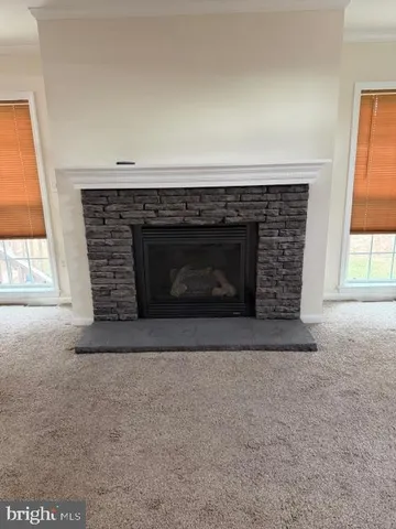 a living room with a fireplace in it