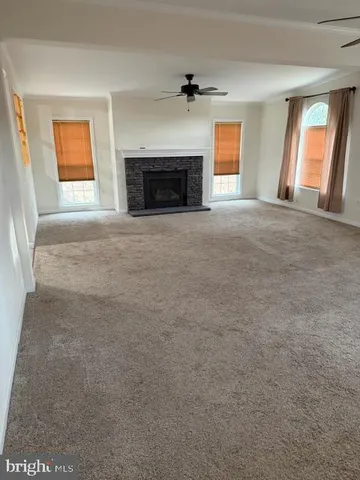 a view of a livingroom with a fireplace