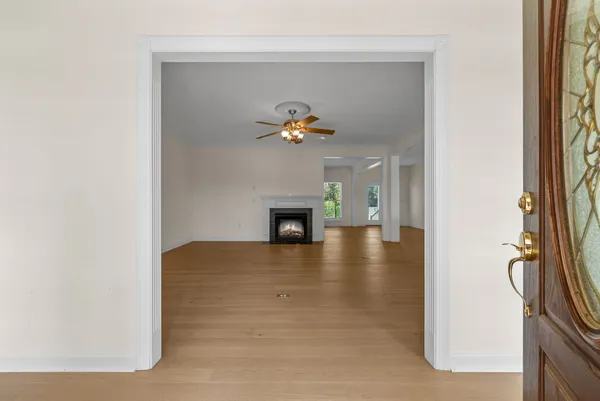 a kitchen with granite countertop white cabinets stainless steel appliances and sink
