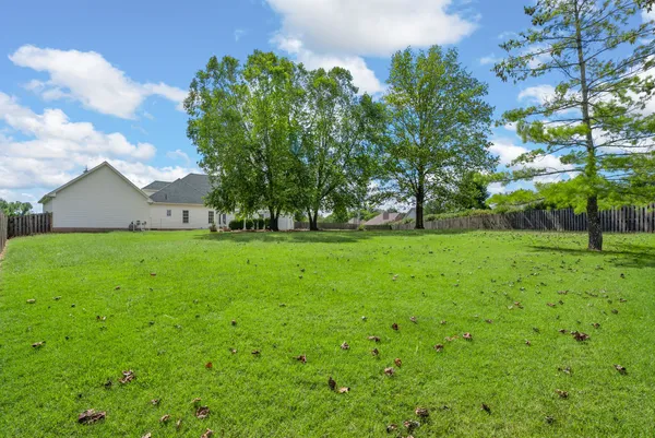 a view of a livingroom with washer and dryer
