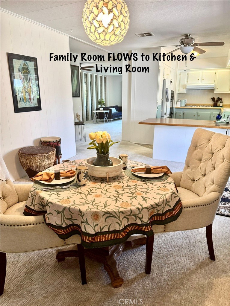 4650 Dulin Road, Unit 11 Fallbrook, CA 92003 - Photo 17 of 38 a living room with furniture and a large window
