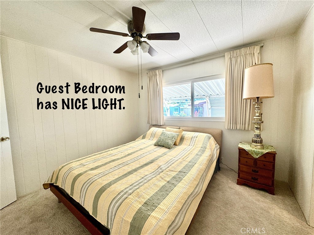 4650 Dulin Road, Unit 11 Fallbrook, CA 92003 - Photo 27 of 38 a bedroom with bed and window