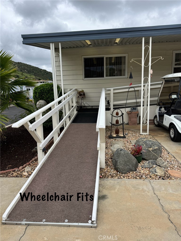 4650 Dulin Road, Unit 11 Fallbrook, CA 92003 - Photo 3 of 38 a view of a couches and dinning table in patio