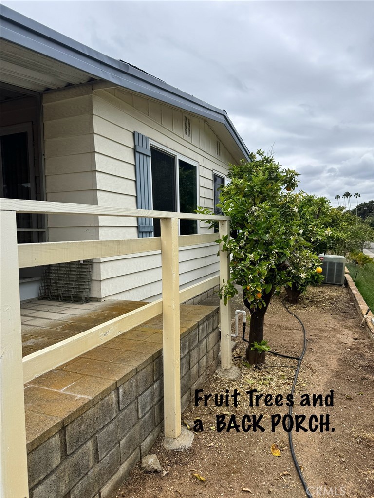 4650 Dulin Road, Unit 11 Fallbrook, CA 92003 - Photo 35 of 38 a view of a house with a tree