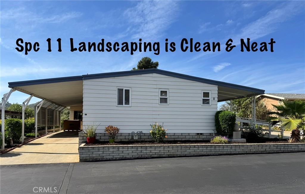 4650 Dulin Road, Unit 11 Fallbrook, CA 92003 - Photo 37 of 38 a view of a house with a street