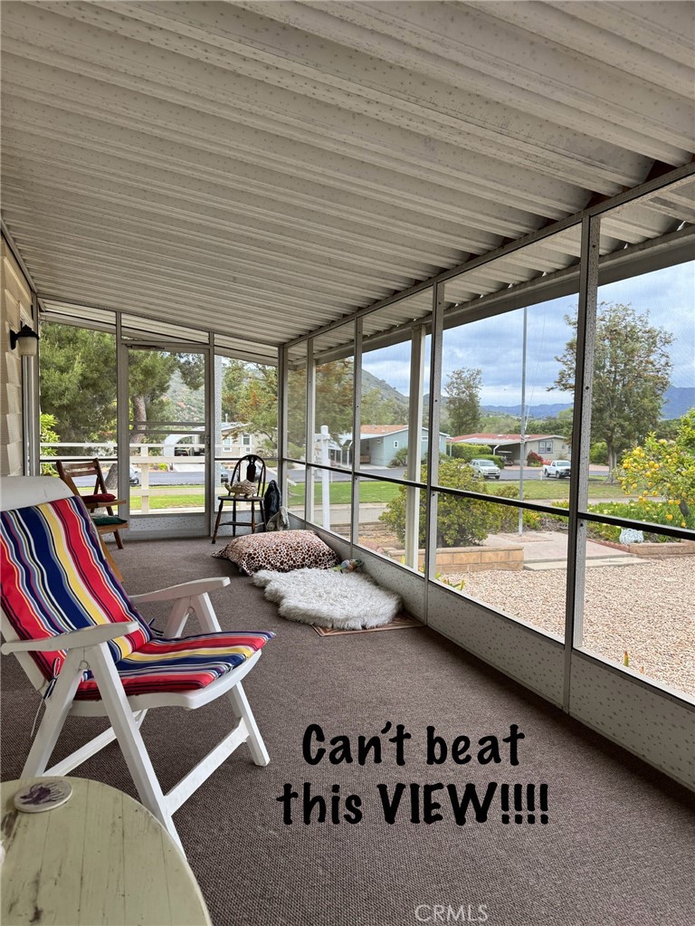 4650 Dulin Road, Unit 11 Fallbrook, CA 92003 - Photo 7 of 38 a room with gym equipment and a large window