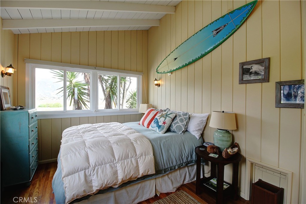 539 Sand Point Road Carpinteria, CA 93013 - Photo 22 of 26 a bedroom with a bed and a window
