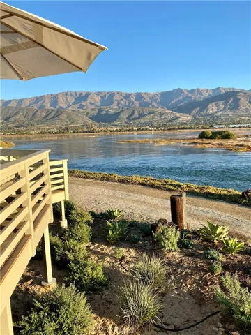 a view of a lake with a mountain