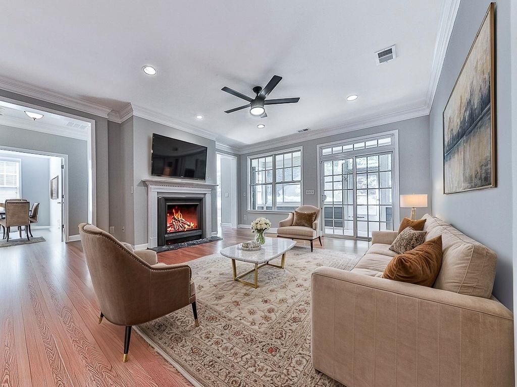 626 Laurel Crossing Canton, GA 30114 - Photo 14 of 77 a living room with furniture fireplace and window