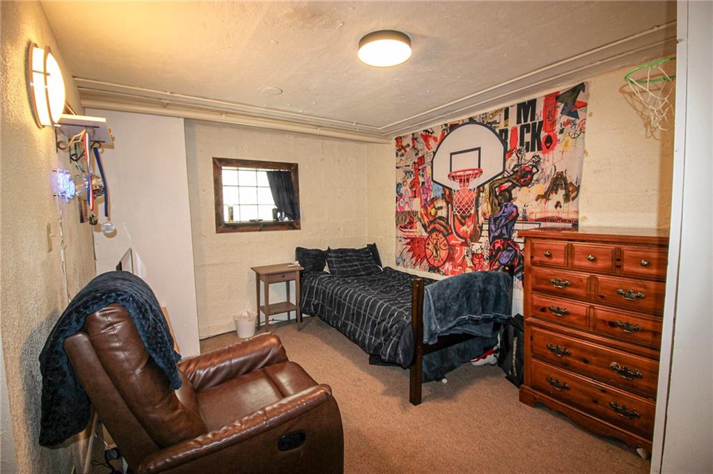 684 Elizabeth Street Bridgeville, PA 15017 - Photo 22 of 34 a bedroom with furniture and a window