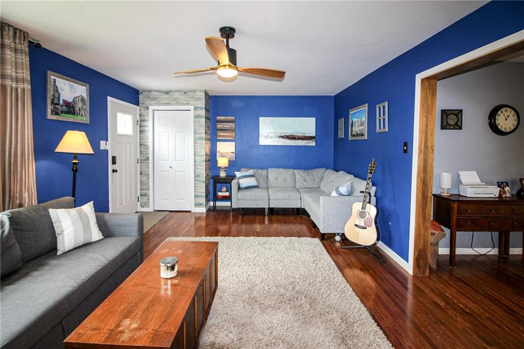684 Elizabeth Street Bridgeville, PA 15017 - Photo 6 of 34 a living room with furniture and wooden floor