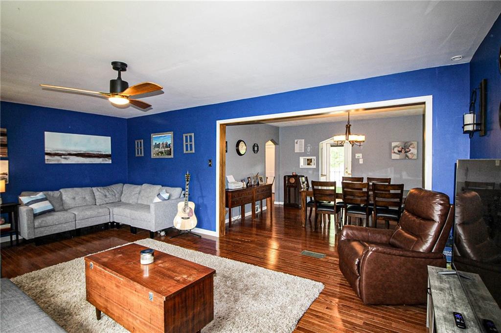 684 Elizabeth Street Bridgeville, PA 15017 - Photo 7 of 34 a living room with furniture and wooden floor