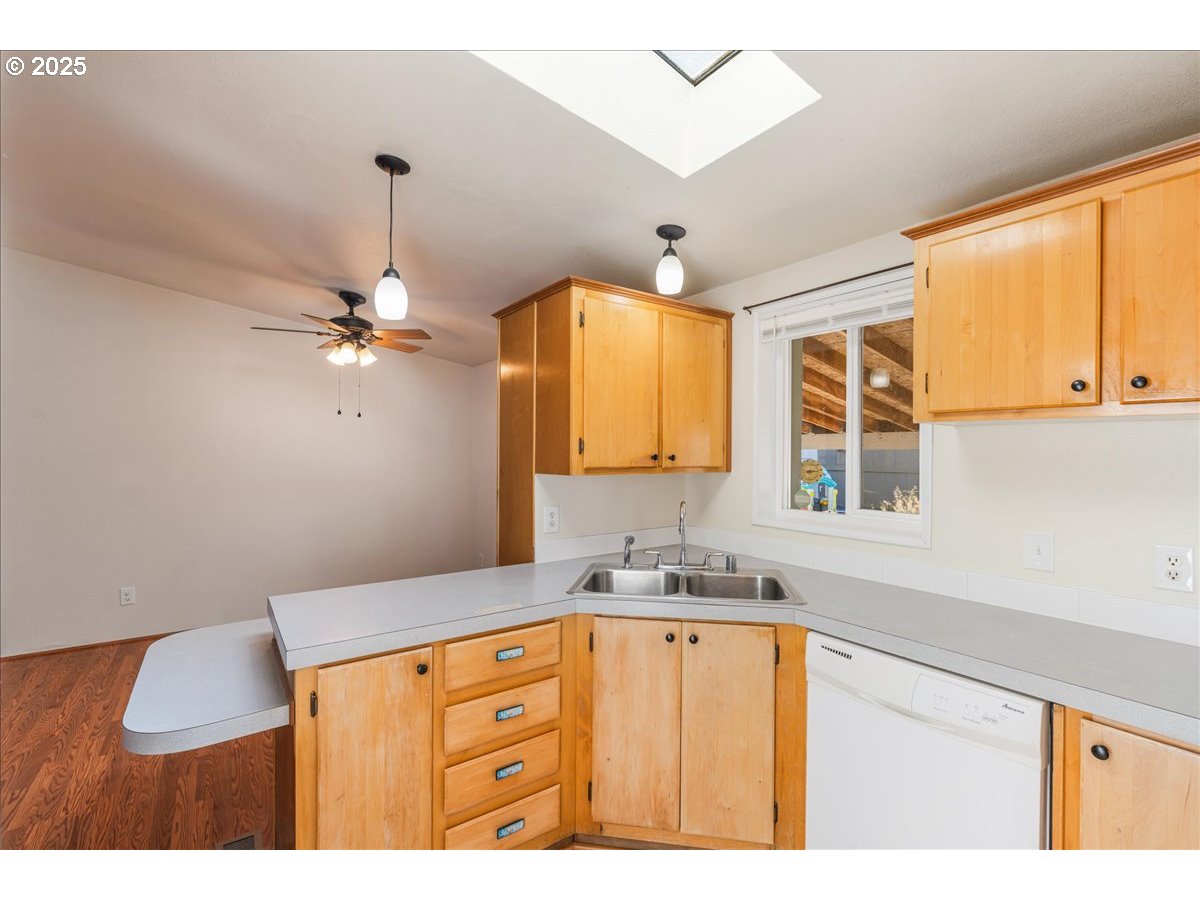 1819 Southeast Orient Drive, Unit 1 Gresham, OR 97080 - Photo 13 of 31 a bathroom with a sink a vanity and a mirror
