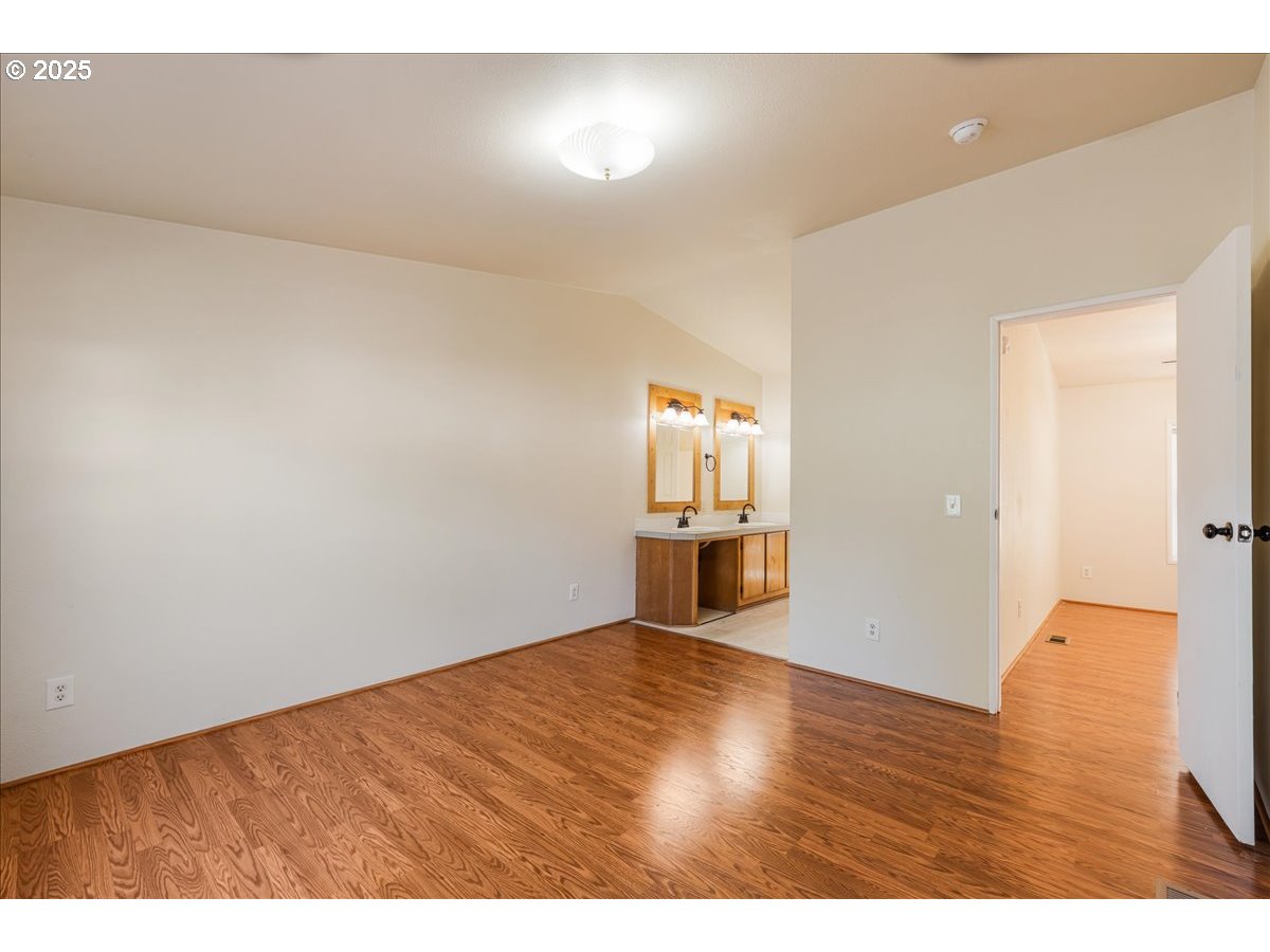 1819 Southeast Orient Drive, Unit 1 Gresham, OR 97080 - Photo 15 of 31 a view of empty room with wooden floor