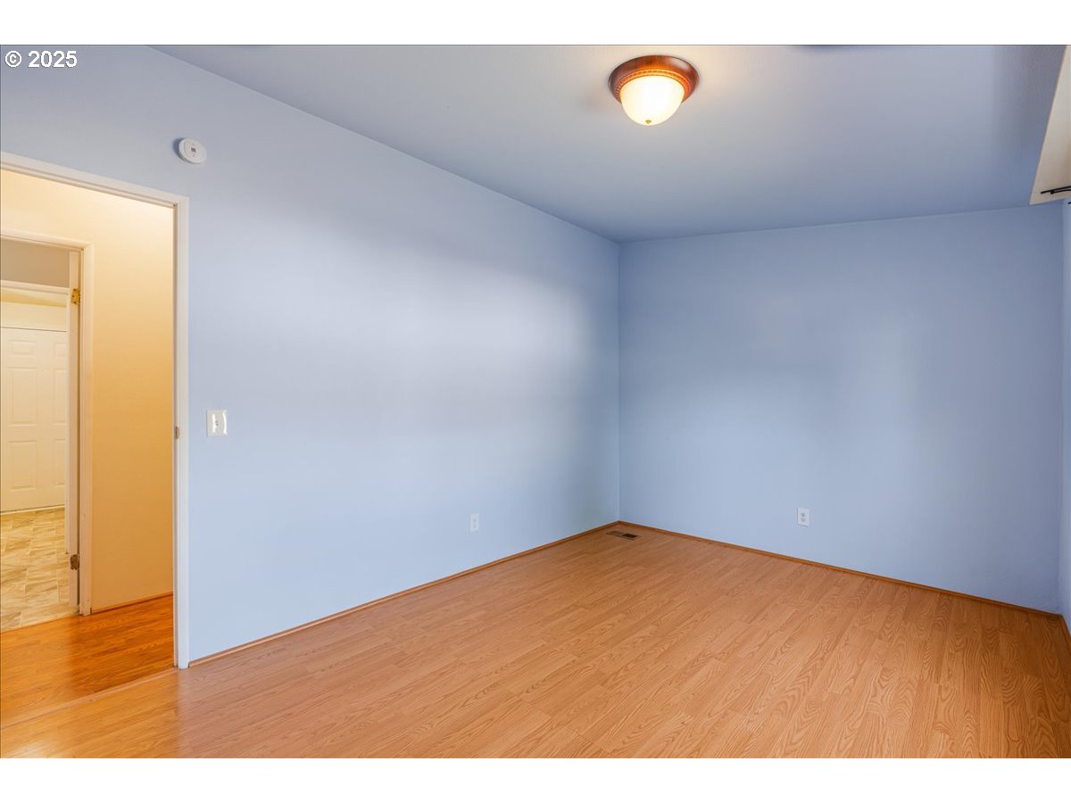 1819 Southeast Orient Drive, Unit 1 Gresham, OR 97080 - Photo 20 of 31 a view of empty room with a fan