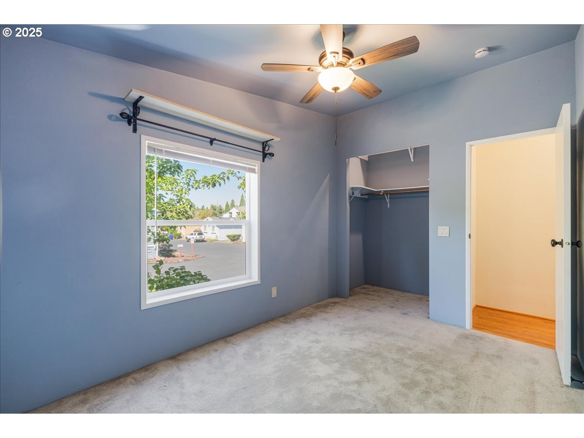 1819 Southeast Orient Drive, Unit 1 Gresham, OR 97080 - Photo 24 of 31 a view of an empty room with a window