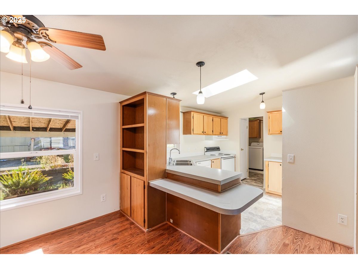 1819 Southeast Orient Drive, Unit 1 Gresham, OR 97080 - Photo 9 of 31 a living room with a couch and a table