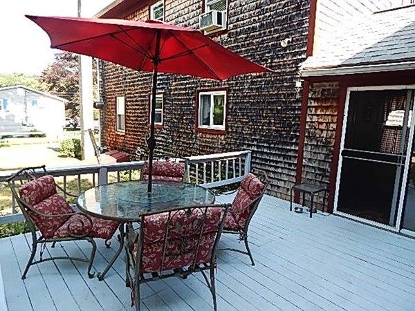 12 Gerard Avenue Freetown, MA 02717 - Photo 11 of 30 a patio with table and chairs