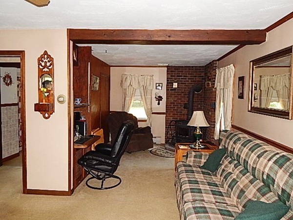 12 Gerard Avenue Freetown, MA 02717 - Photo 14 of 30 a living room with furniture a couch and large window