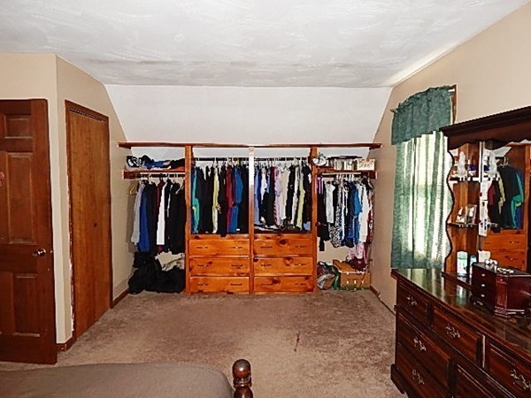 12 Gerard Avenue Freetown, MA 02717 - Photo 23 of 30 a view of walk in closet with clothes