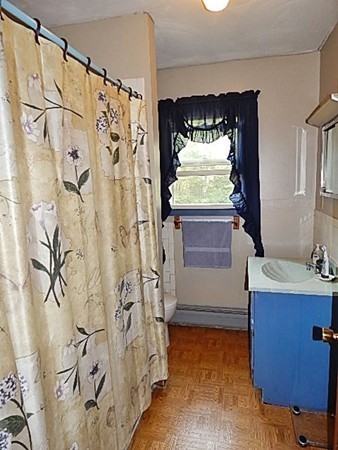 12 Gerard Avenue Freetown, MA 02717 - Photo 27 of 30 a bathroom with a bathtub and shower