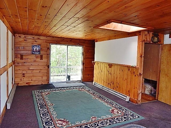 12 Gerard Avenue Freetown, MA 02717 - Photo 30 of 30 a view of an empty room with a fireplace