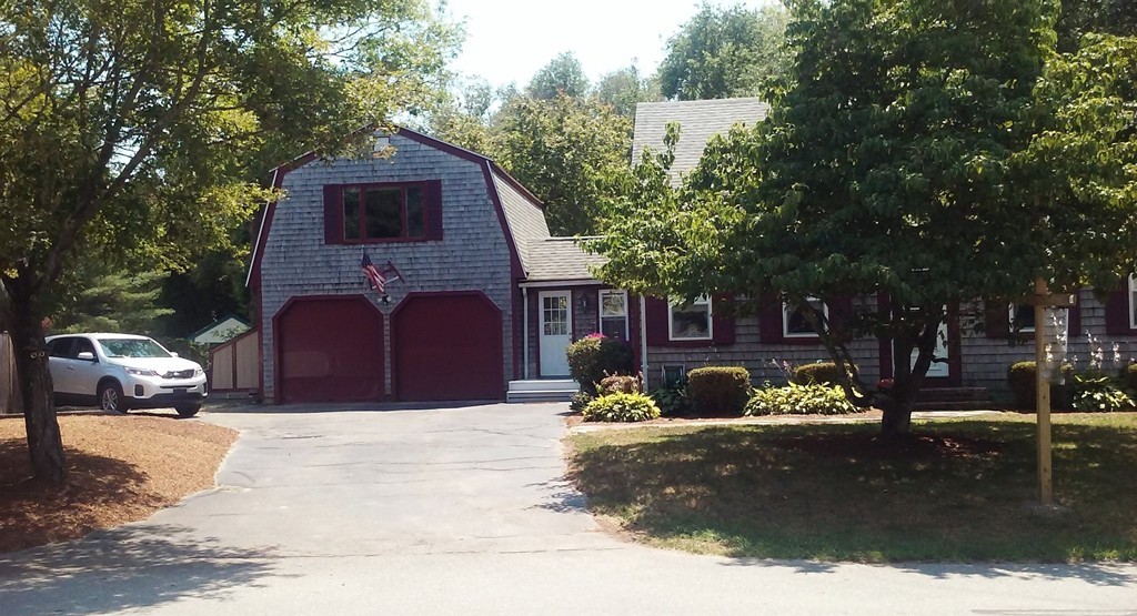 12 Gerard Avenue Freetown, MA 02717 - Photo 4 of 30 a front view of a house with a yard
