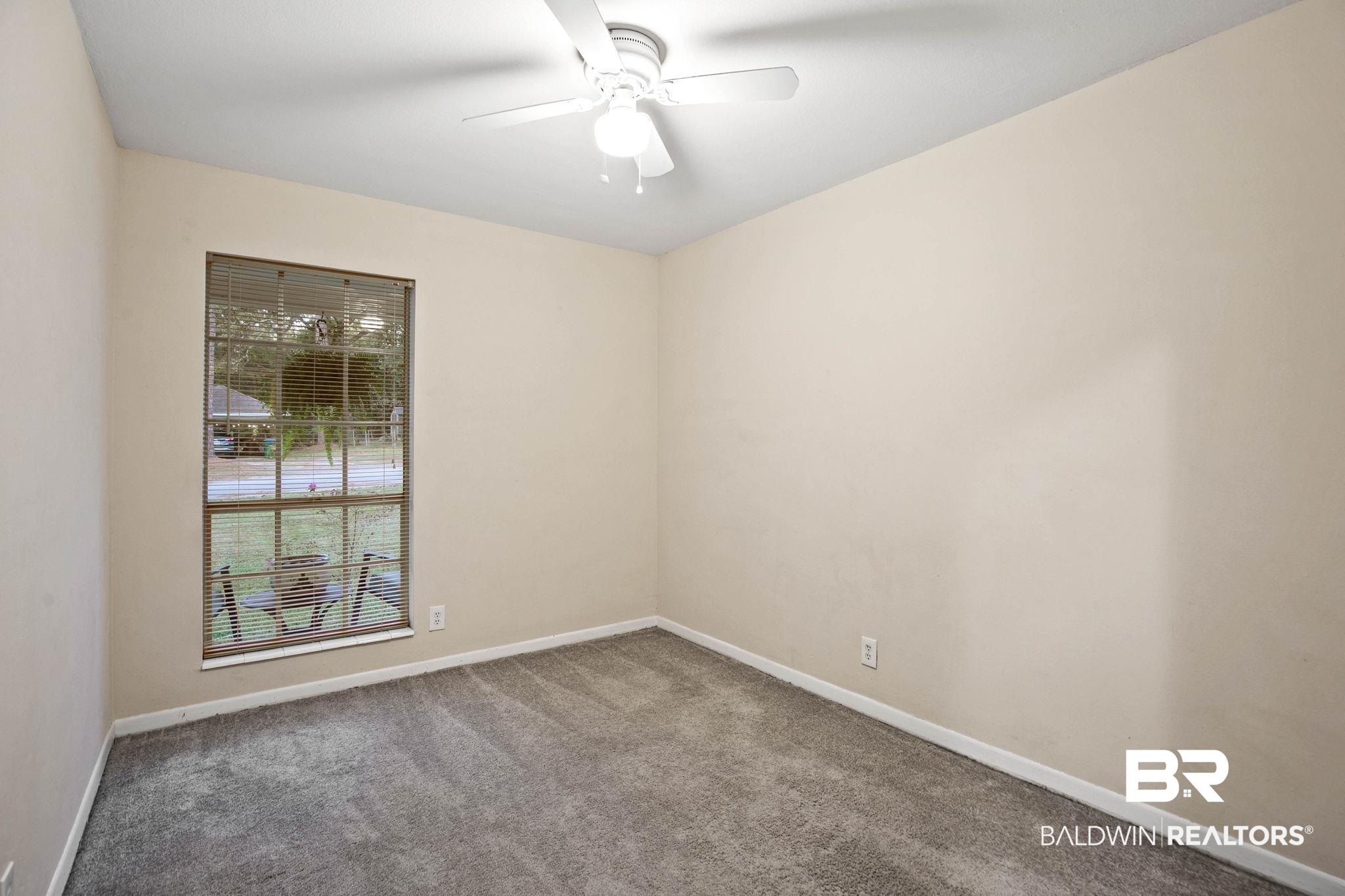 4 Rally Road Spanish Fort, AL 36527 - Photo 31 of 41 Carpeted spare room featuring baseboards and ceiling fan