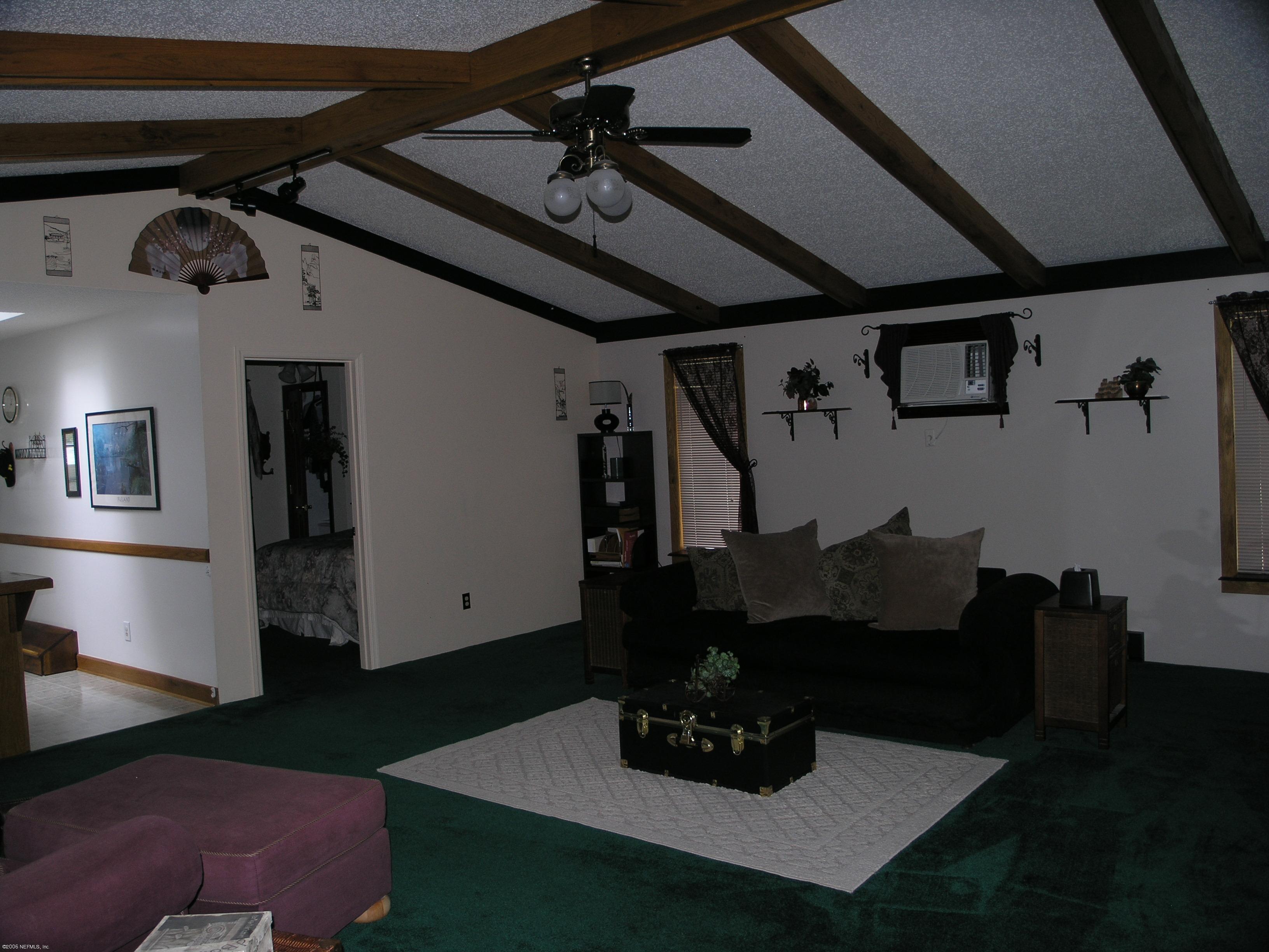 4624 South Bellamy Road Keystone Heights, FL 32656 - Photo 3 of 12 Beam Ceilings Living Room