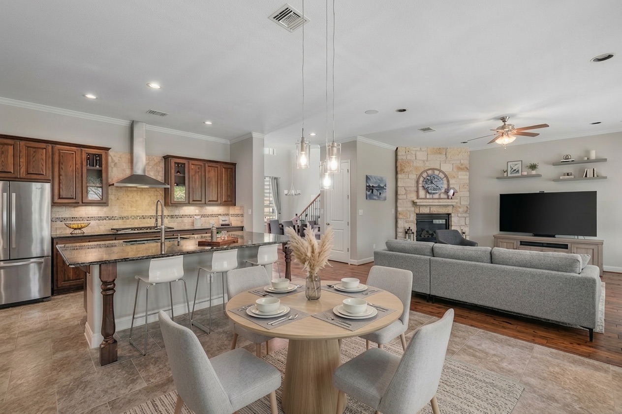 151 Swallowtail Drive Austin, TX 78737 - Photo 40 of 40 a living room with stainless steel appliances kitchen island granite countertop furniture and a view of kitchen