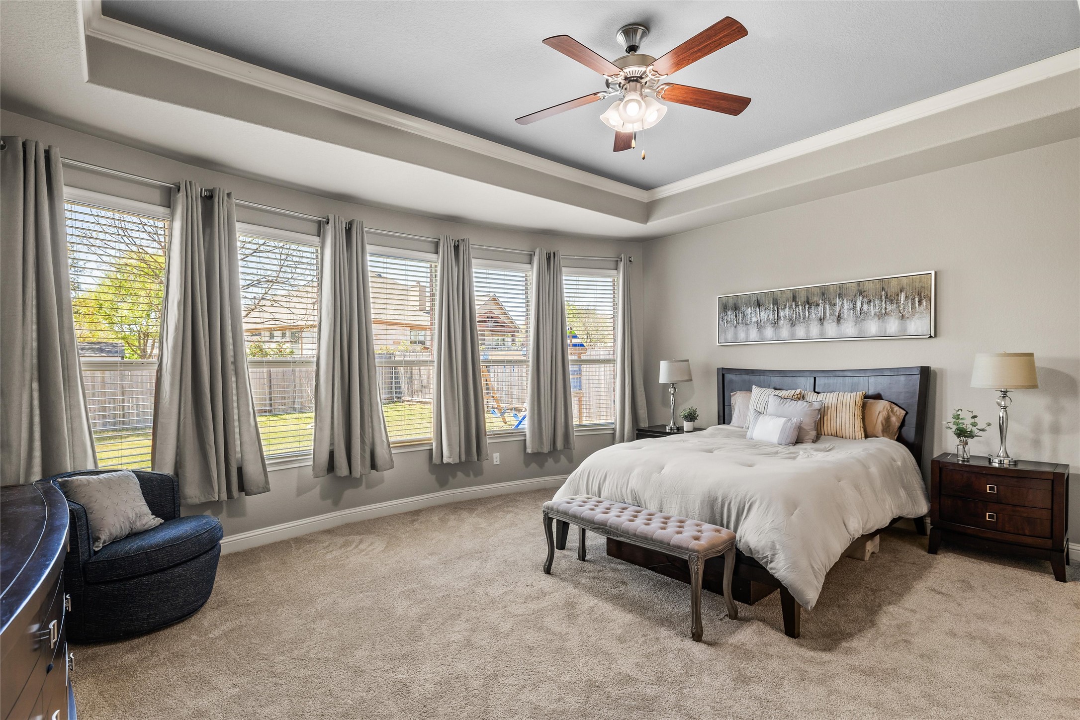 151 Swallowtail Drive Austin, TX 78737 - Photo 13 of 40 a bedroom with a bed and a couch next to a window