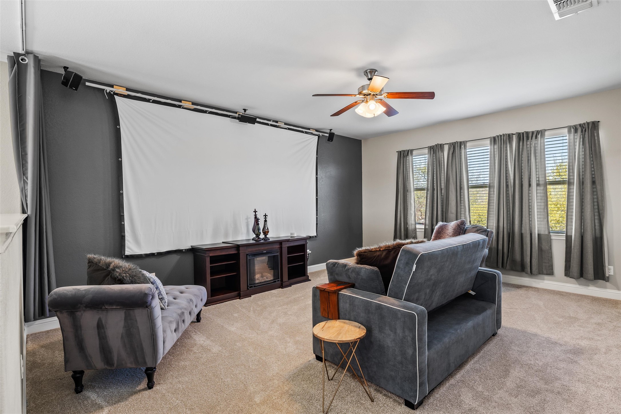 151 Swallowtail Drive Austin, TX 78737 - Photo 19 of 40 a living room with furniture and a chandelier
