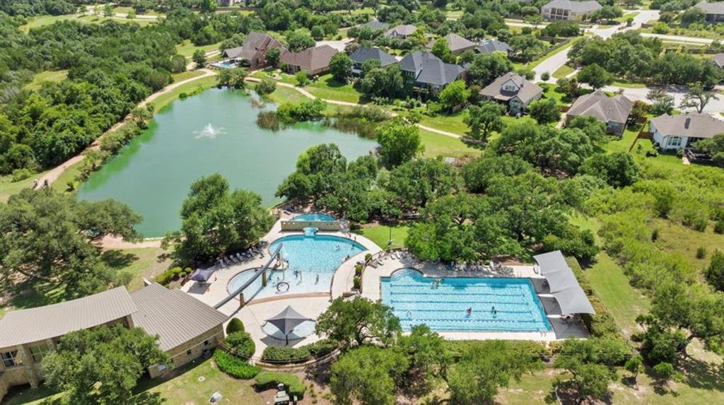 151 Swallowtail Drive Austin, TX 78737 - Photo 35 of 40 an aerial view of a house with a yard and lake view